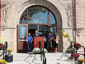 Cass County Administrator Matthew Newton addresses the crowd at the 125th anniversary celebration