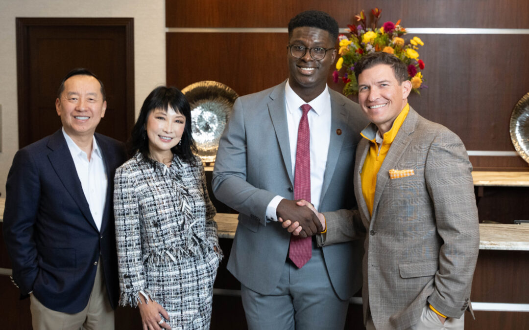Zhangs Receive Ellis Island Medal