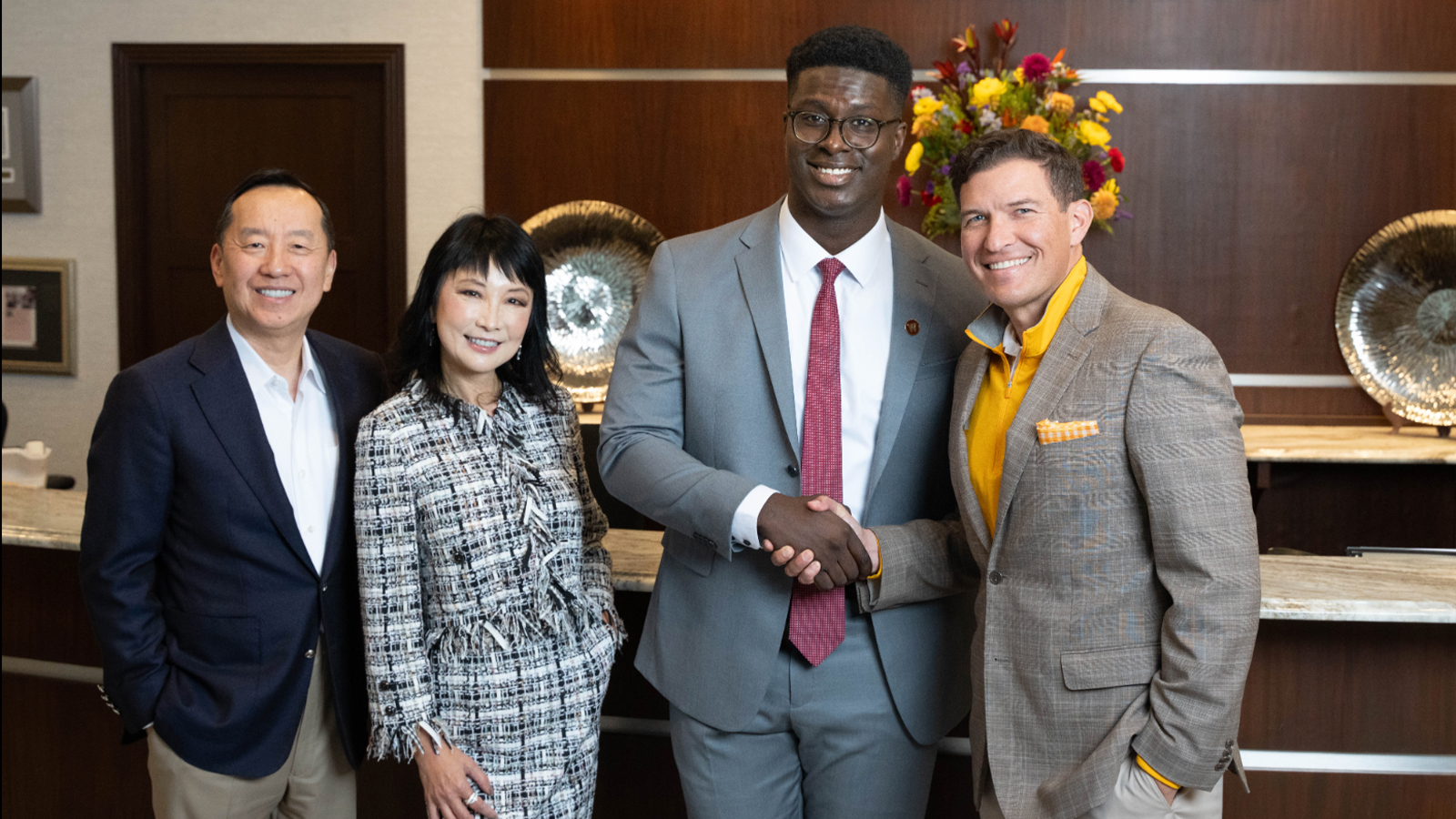 Zhangs Receive Ellis Island Medal